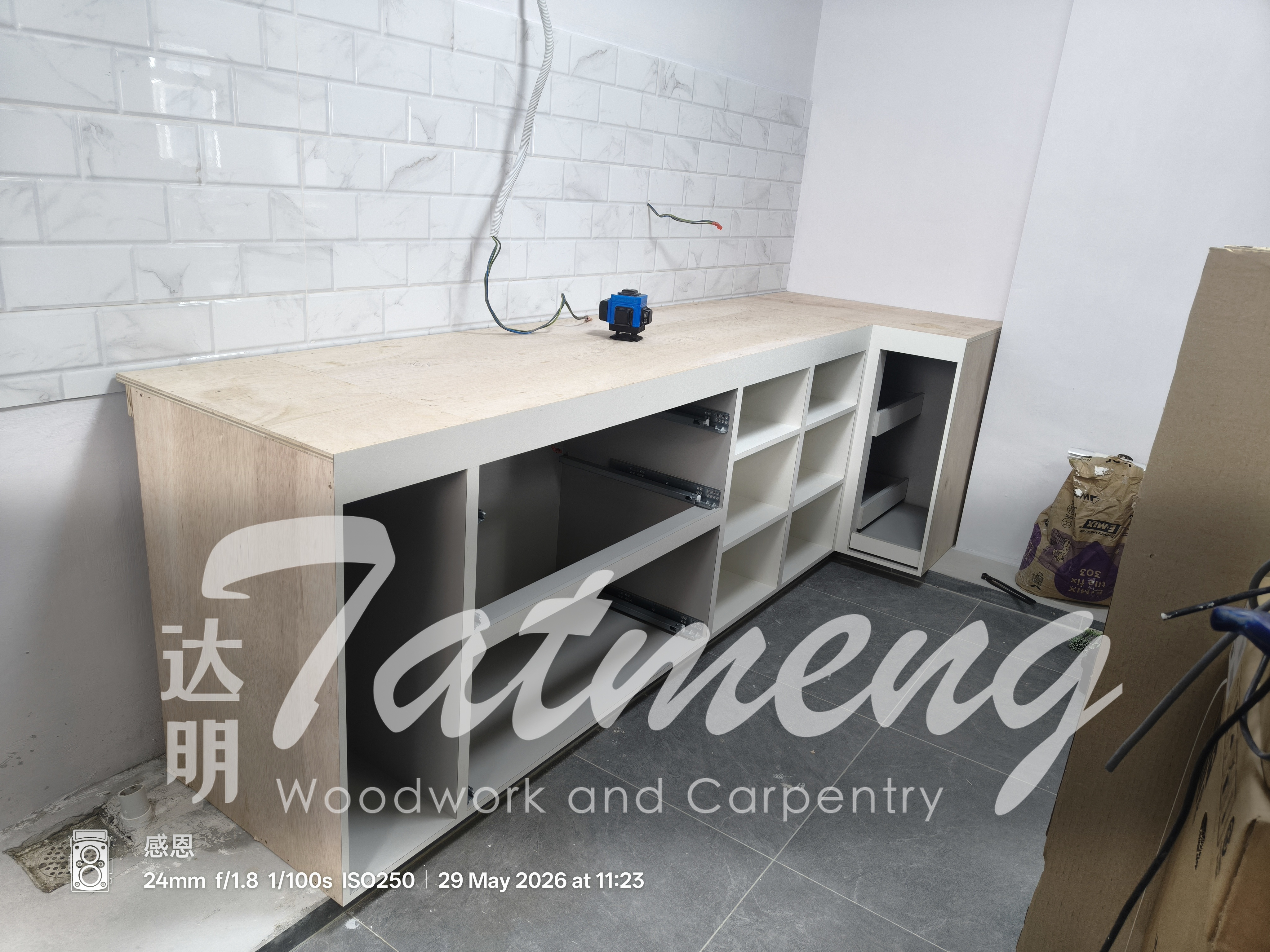 Real custom kitchen cabinetry installation on-site